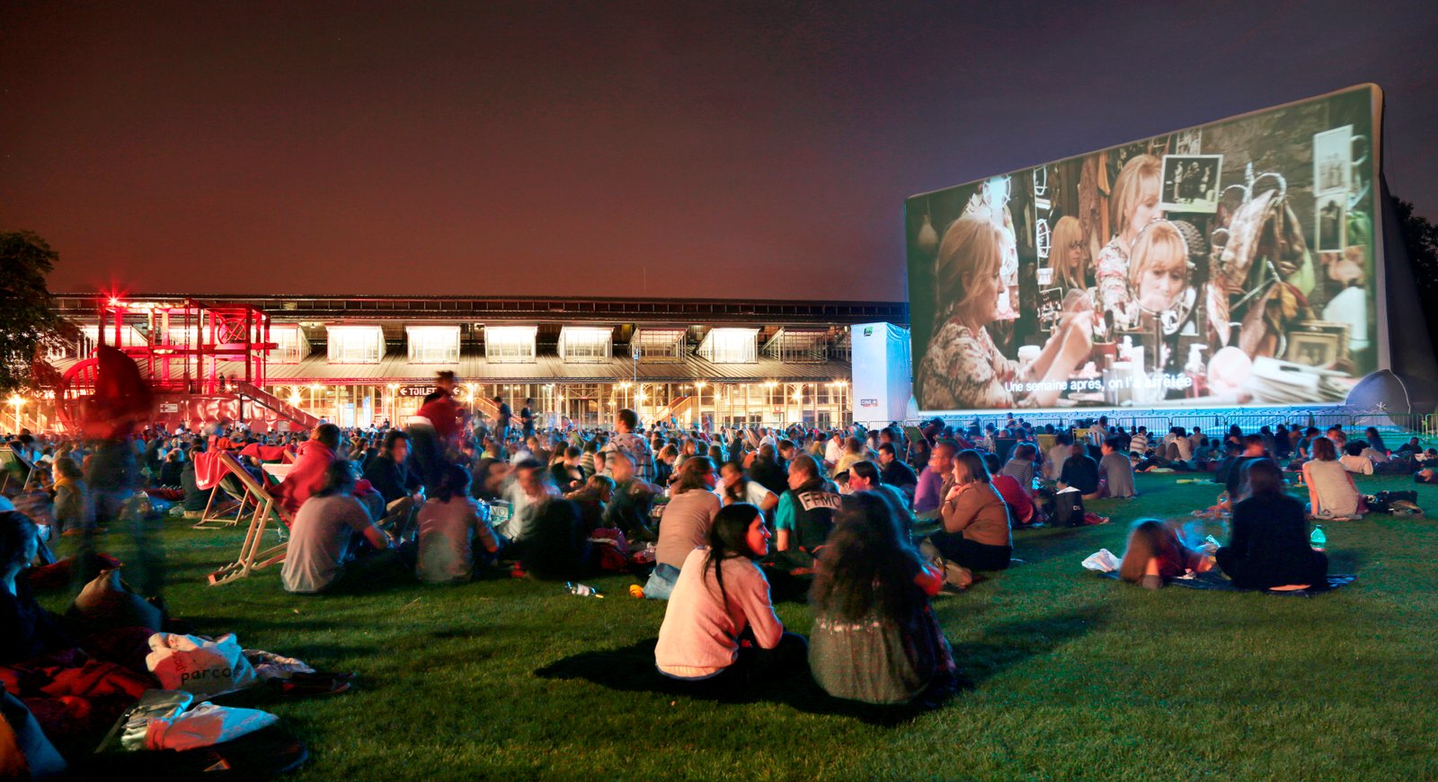 Locals watch a movie at the outdoor cinema at La Villette.