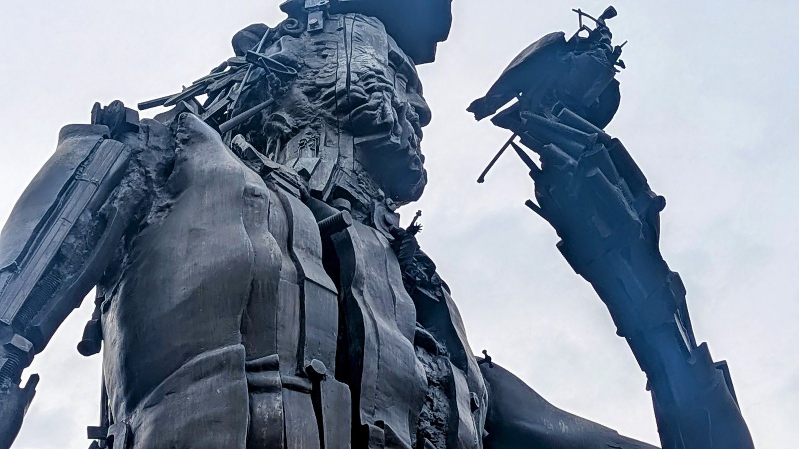 A close up of César's centaur statue with the miniature Statue of Liberty poking out.